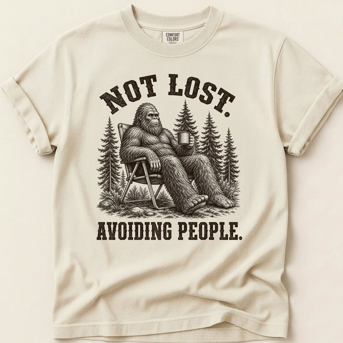Avoiding People Bigfoot T-shirt on Ivory