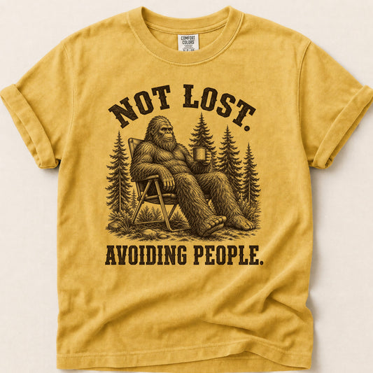 Avoiding People Bigfoot T-shirt on Mustard