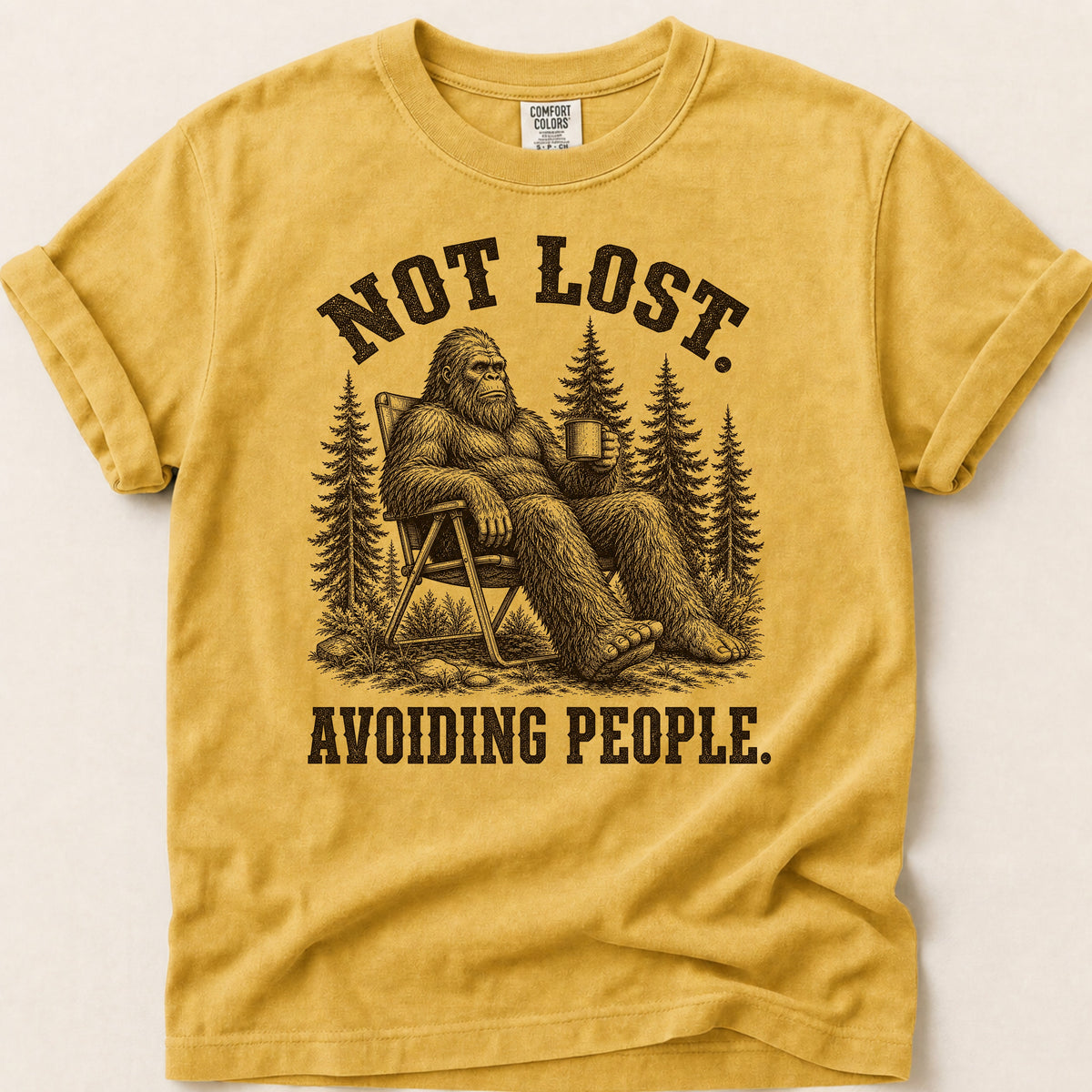 Avoiding People Bigfoot T-shirt on Mustard