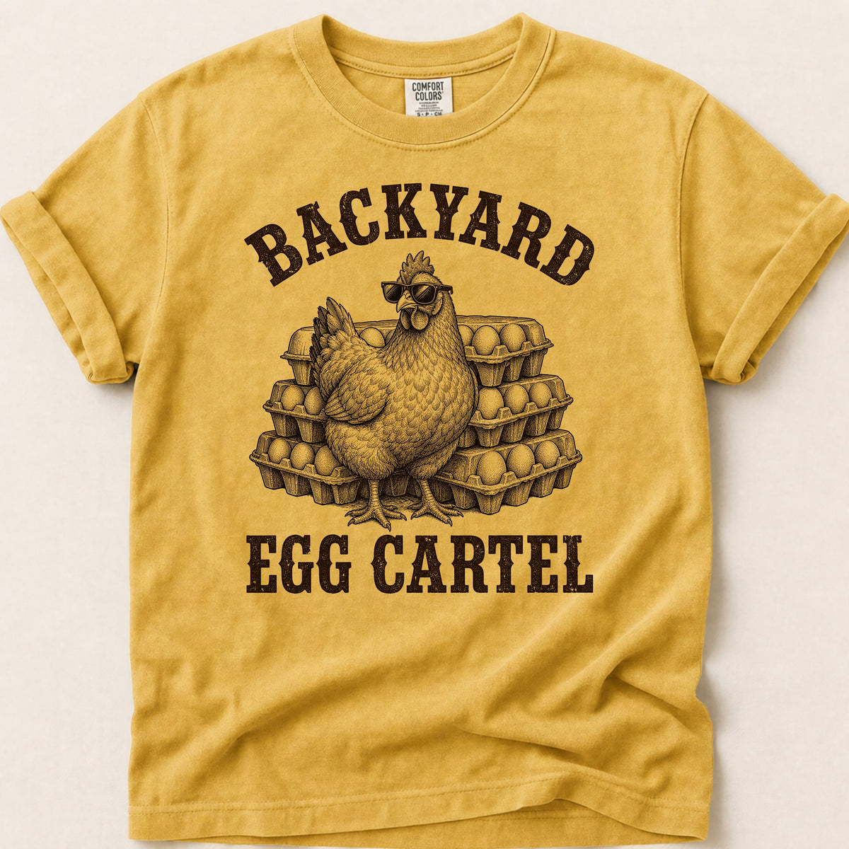 Backyard Egg Cartel T-shirt on Mustard