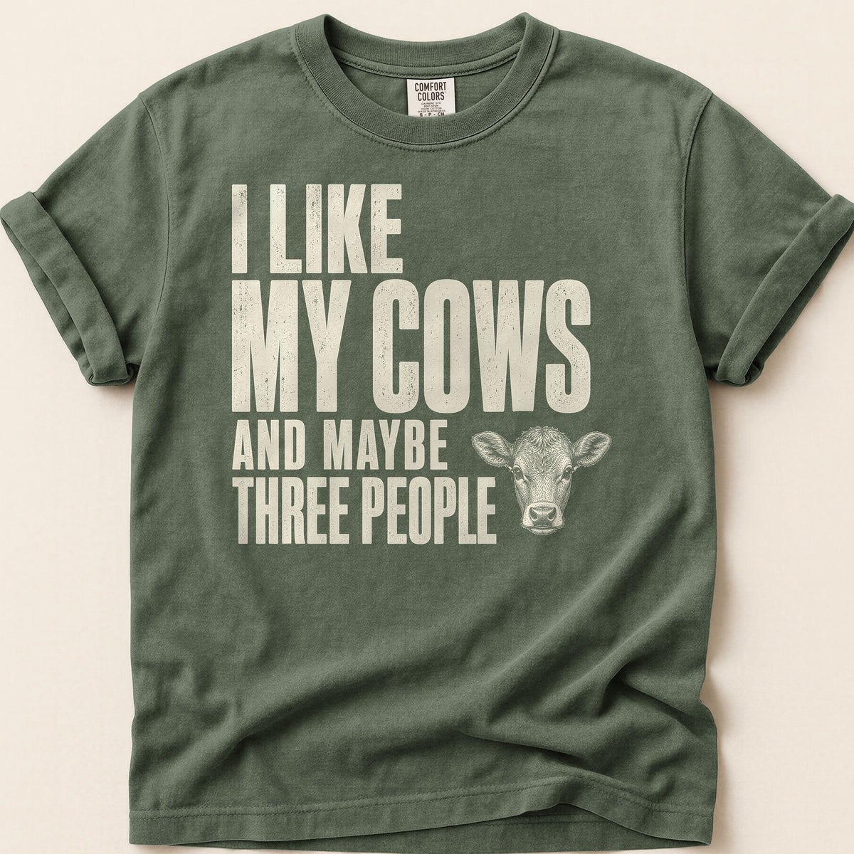 Cows And Three People T-shirt on Moss
