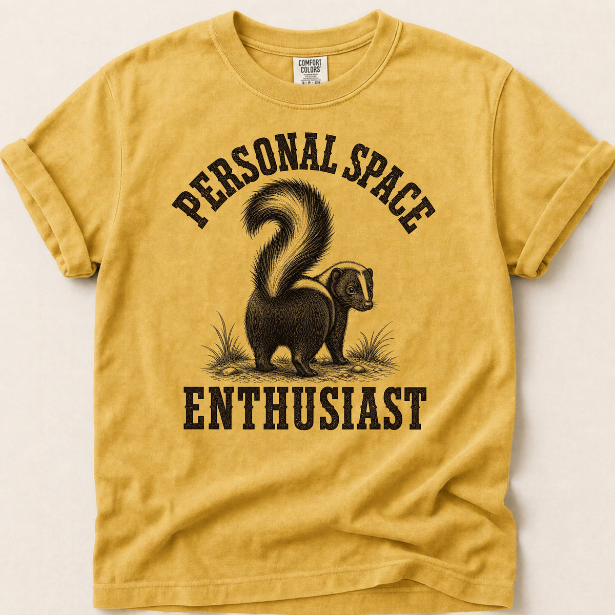 Personal Space Skunk T-shirt on Mustard