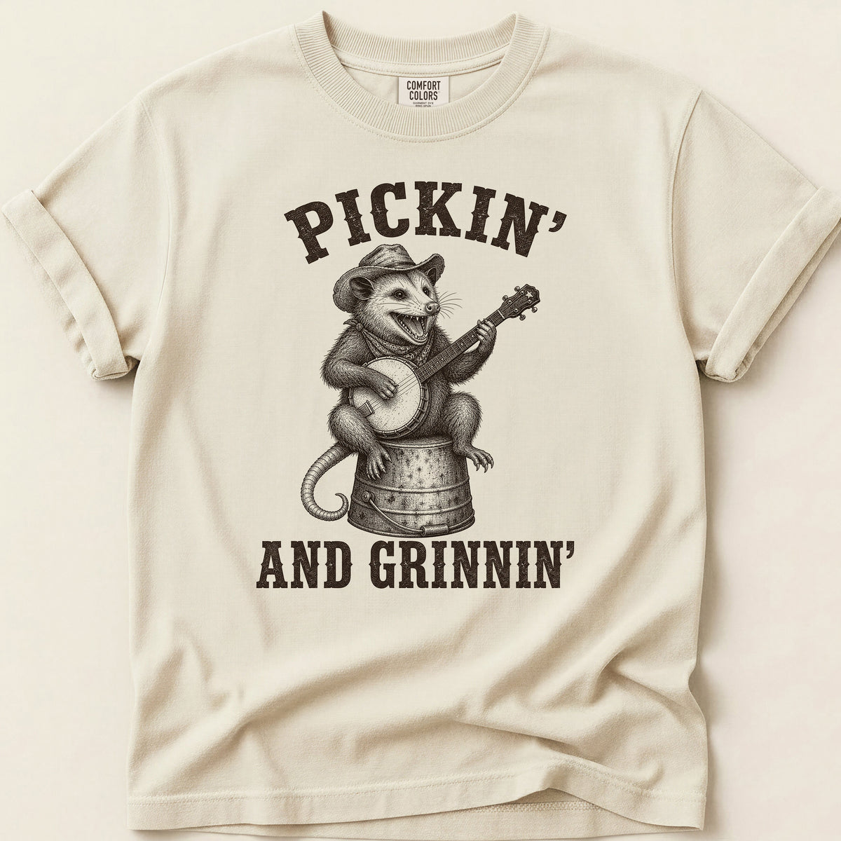 Pickin And Grinnin Possum T-shirt on Ivory