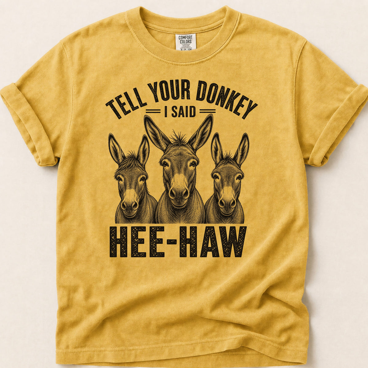 Tell Your Donkey T-shirt on Mustard